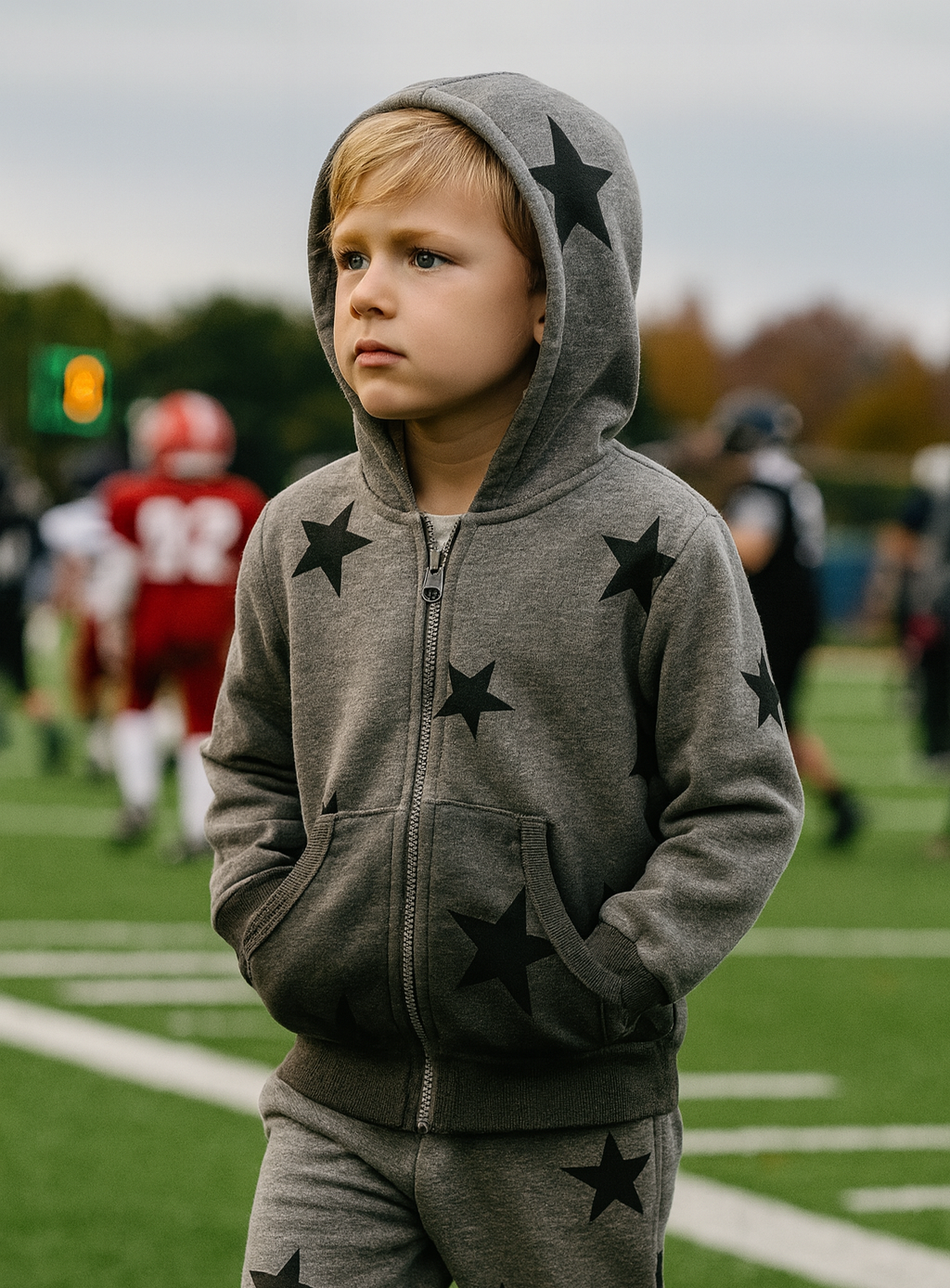 Grey boys’ hoodie and jogger set with black star pattern, gradient design, zip-up front, and ribbed cuffs