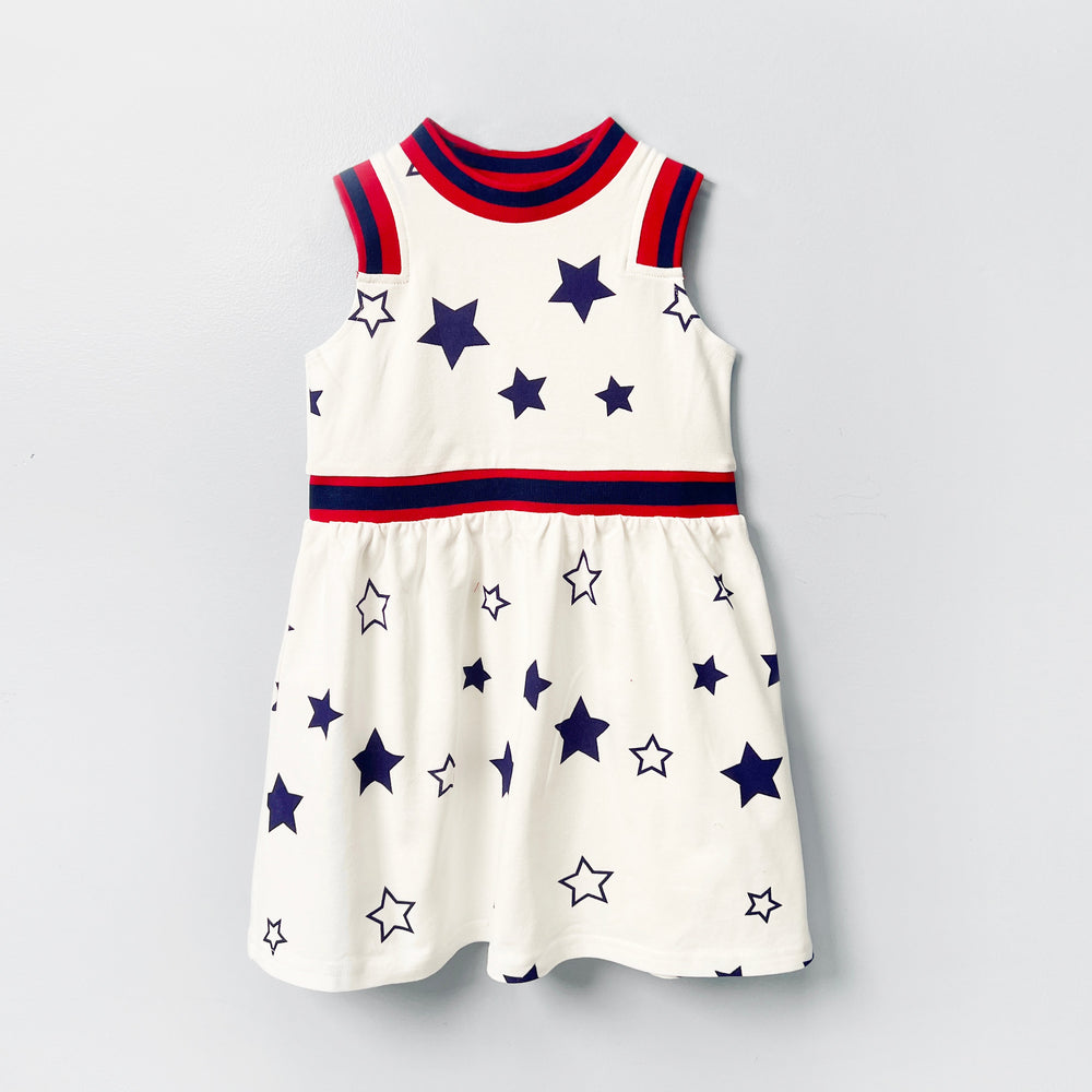 girls white dress, star print girls dress, patriotic summer outfit, toddler dress with stars, sleeveless girls cotton dress, red white blue dress girl, kids summer party outfit, breathable girls twirl dress, trendy 4th of July kids fashion, girls dress with striped trim