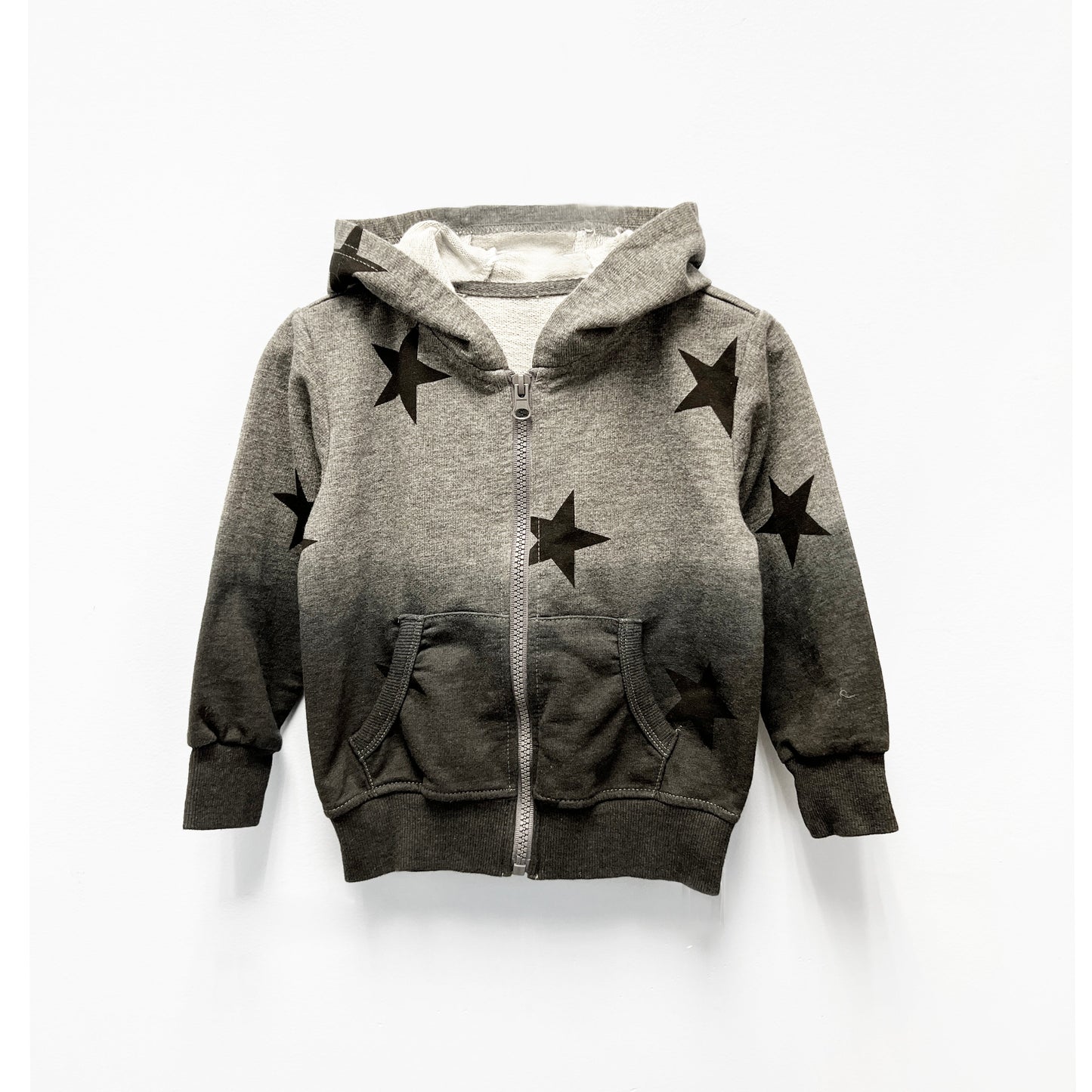 
                  
                    Grey boys’ hoodie and jogger set with black star pattern, gradient design, zip-up front, and ribbed cuffs
                  
                